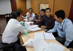 Admissions committee evaluating interviews