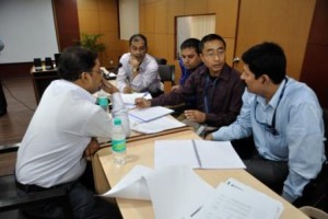 Admissions committee evaluating interviews